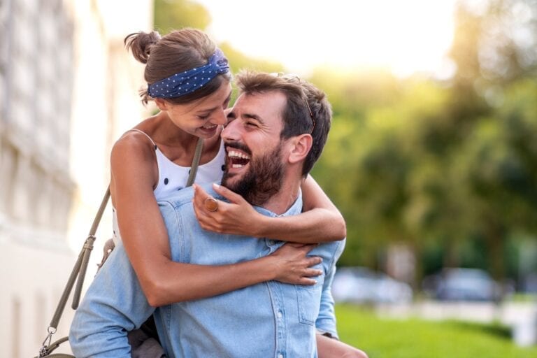 Couple, piggy back ride