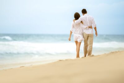couple walking at the beach