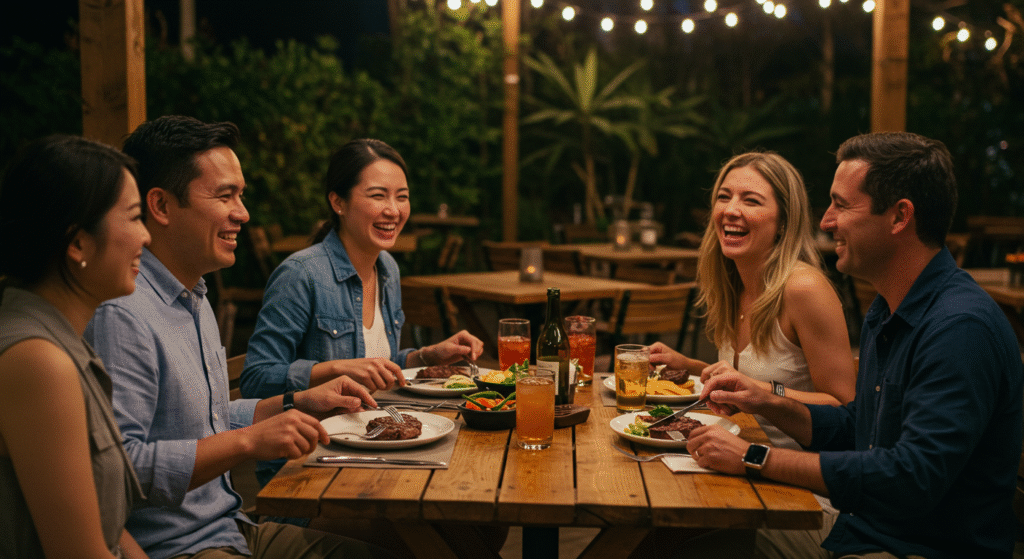 Spouse smiling while being complimented in front of friends, illustrating public praise in marriage