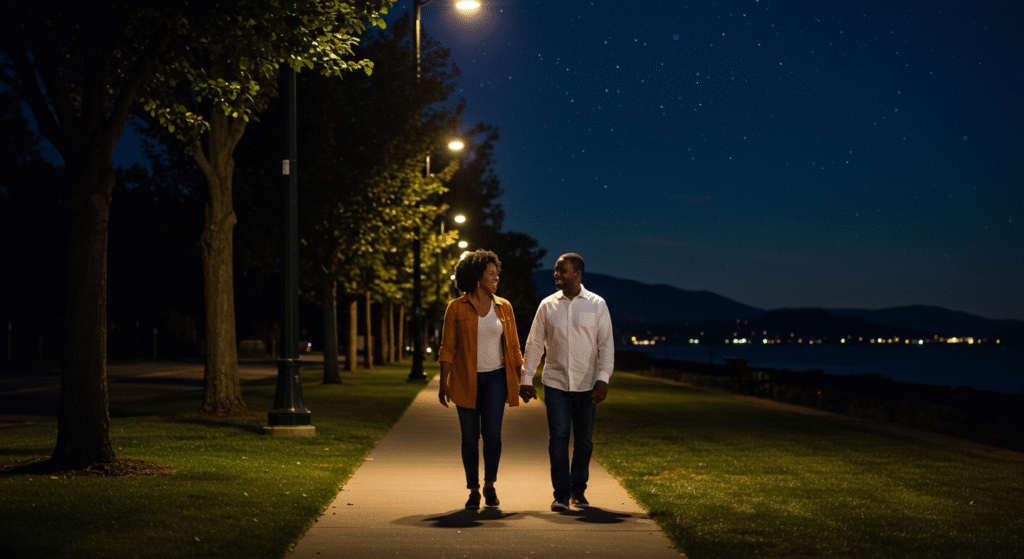 Husband and wife walking hand-in-hand during an evening stroll, prioritizing time together