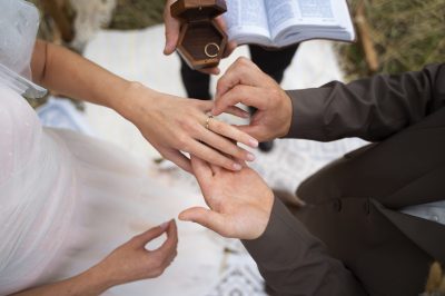 Engagement ring on an open Bible, symbolizing a Christ-centered marriage decision.
