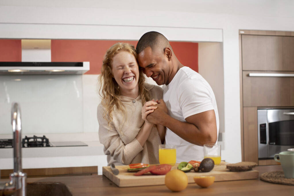 Husband and wife sharing a brief but meaningful hug before their day begins