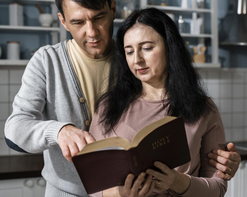 Christian couple reading the Bible together, symbolizing shared faith in marriage