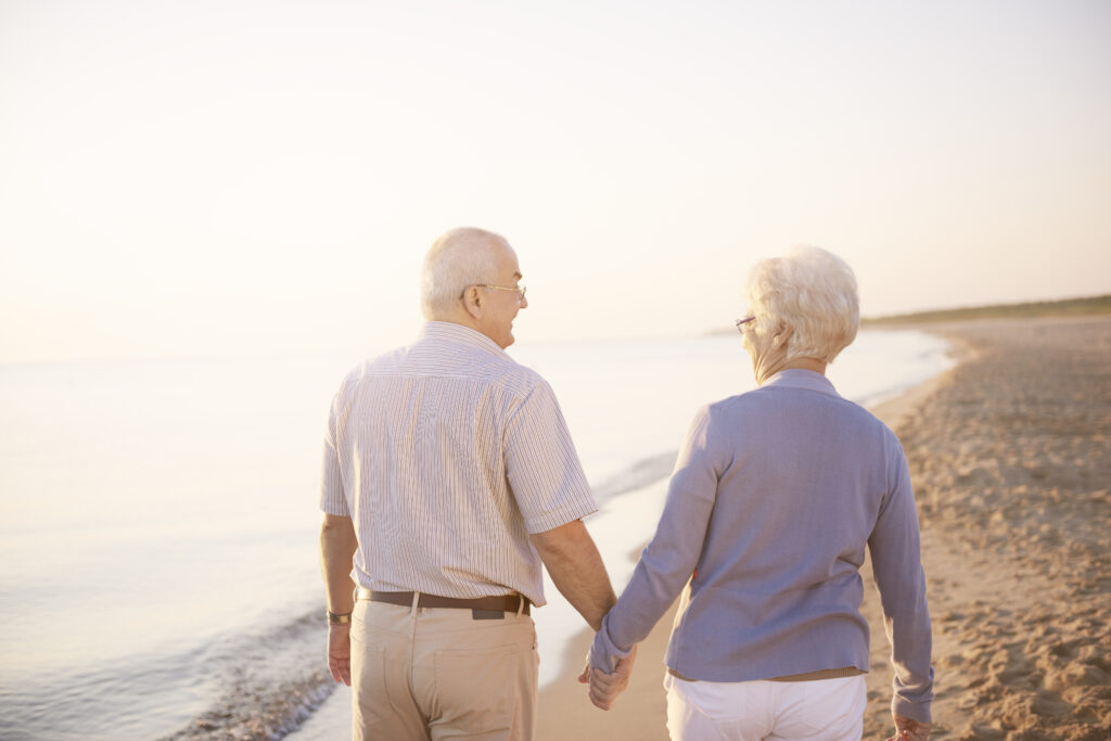 Older married couple walking together, symbolizing lifelong loyalty and love