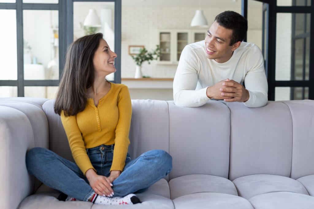 Married couple having a calm and curious conversation, demonstrating emotional maturity