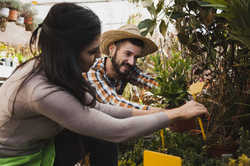Spouses nurturing a shared garden, symbolizing mutual effort and relational growth