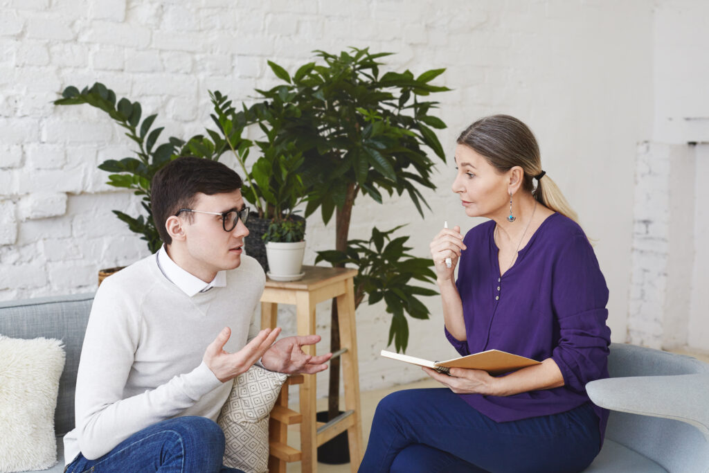Individual receiving professional support to process emotional wounds affecting their relationship