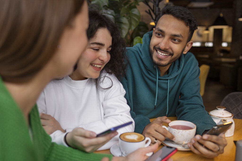 Spouse speaking positively about their partner in a group setting, showing loyalty and respect.