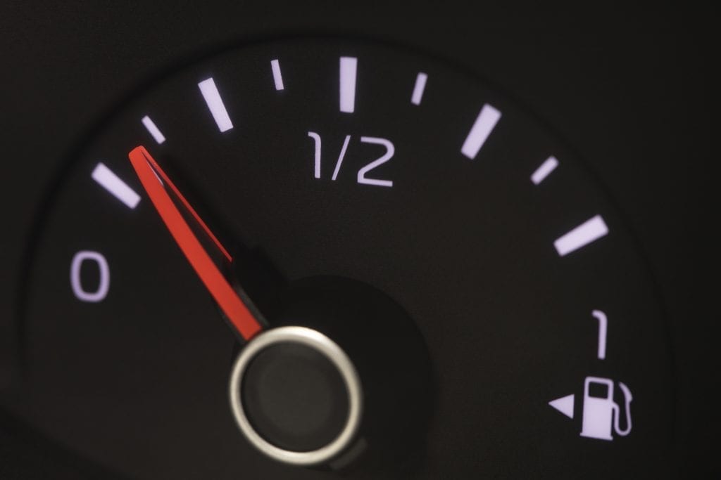 Car dashboard fuel warning symbolizing emotional depletion in marriage