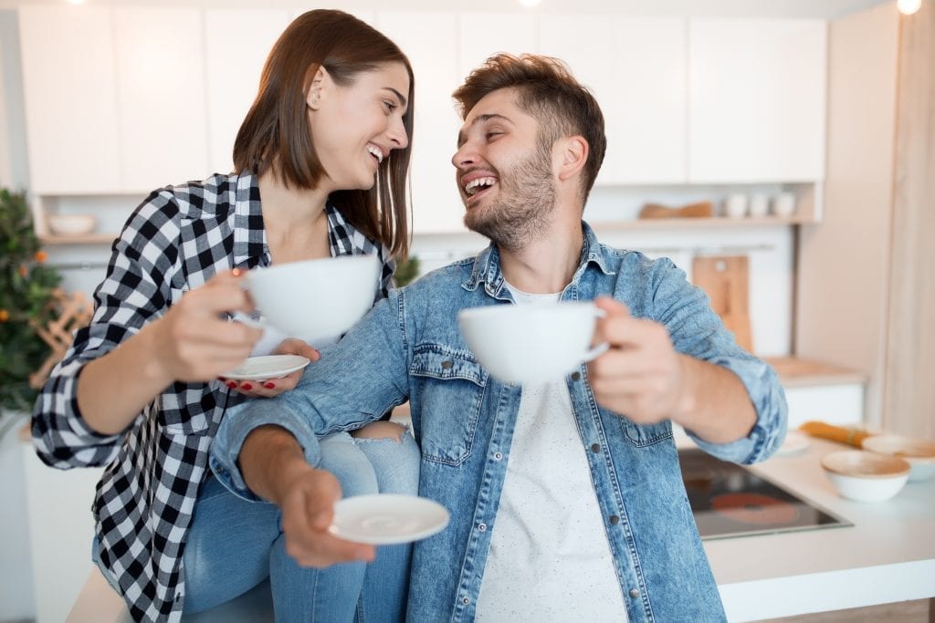 Married couple reminiscing in a healthy way, strengthening connection.