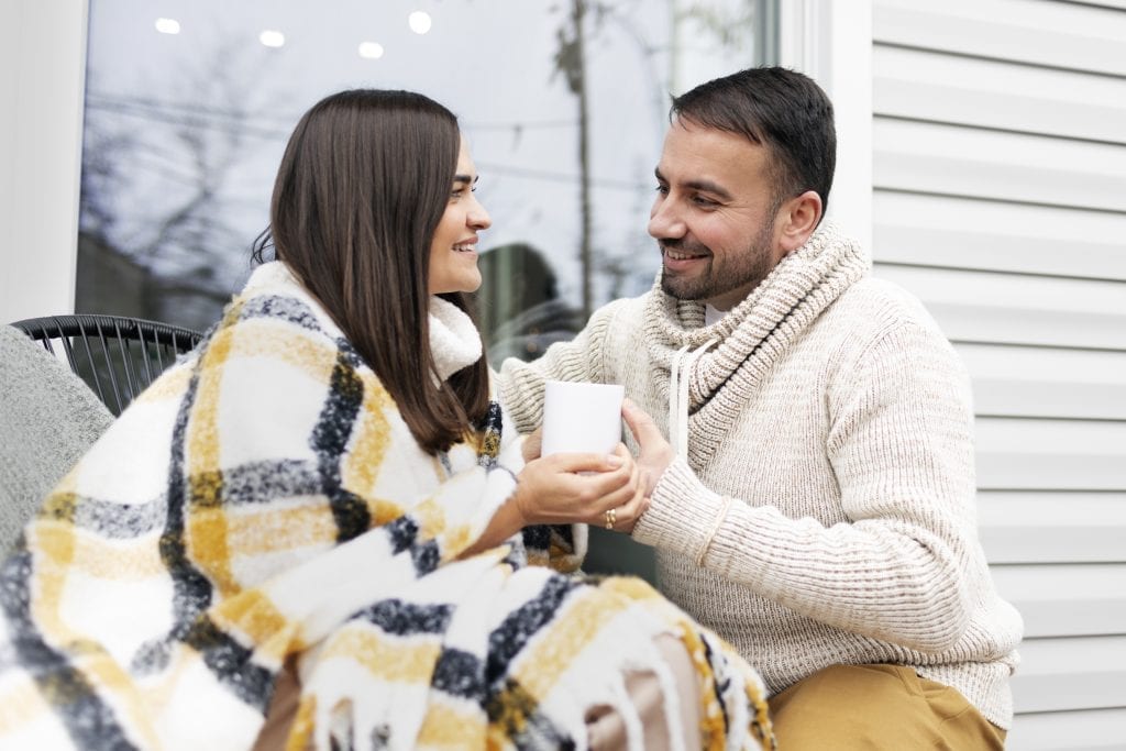Safe and comforting moment between spouses rebuilding emotional trust