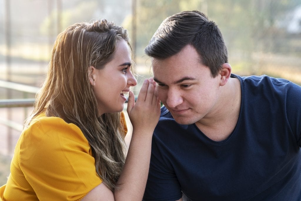 Loving affirmation shared quietly between partners, fostering connection