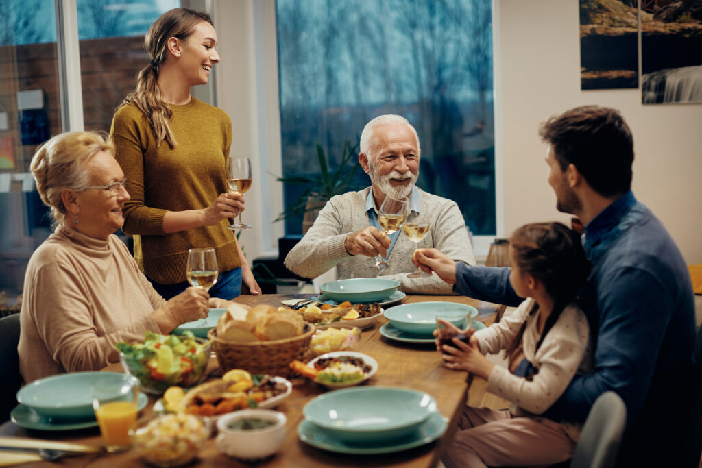 Multigenerational family dinner led by a wise, loving couple who model marriage well