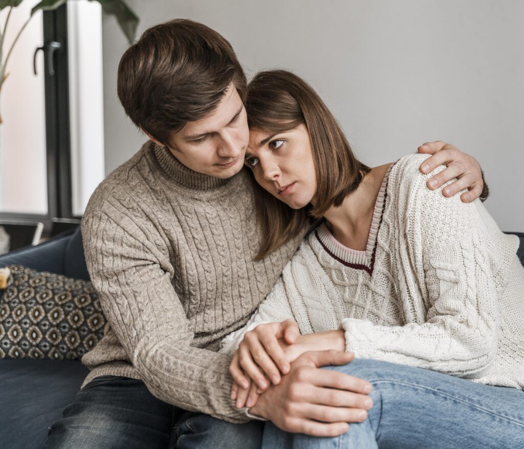 Married couple reconnecting emotionally after working through conflict.