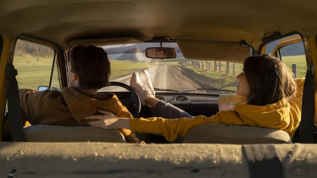 Driver inspecting engine, symbolizing intentional effort in maintaining marriage