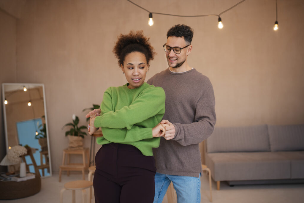 Spouses rekindling emotional intimacy through play and shared jo