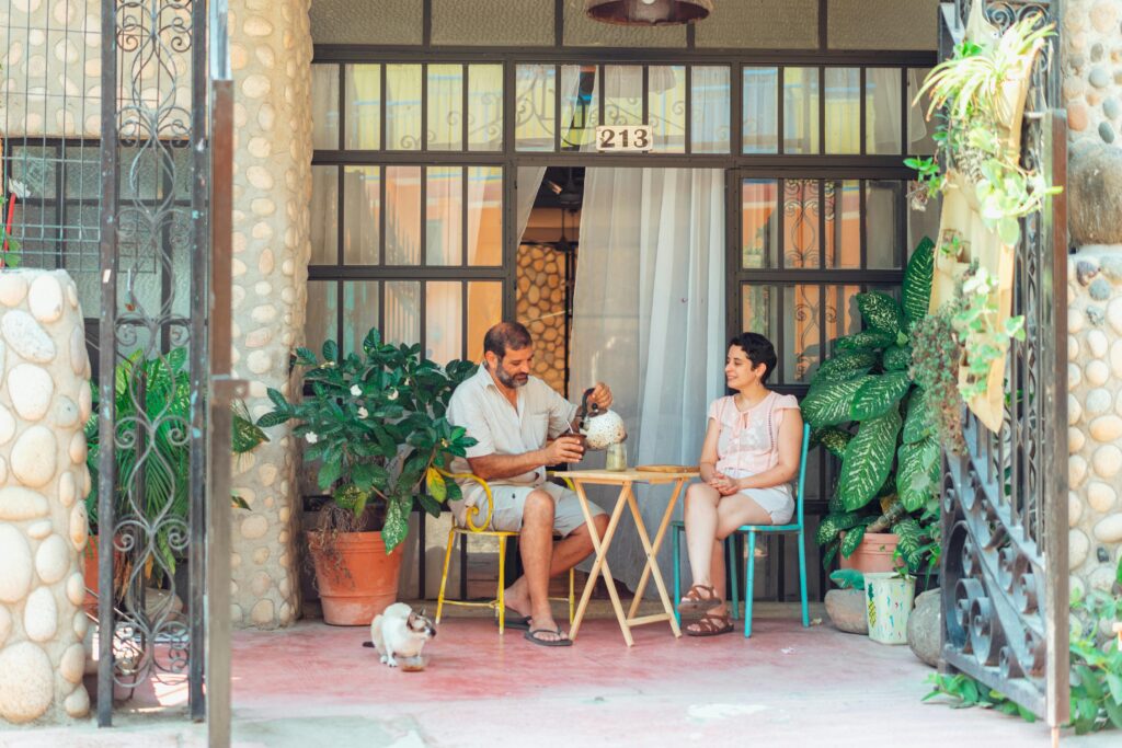 Married couple connecting during a quiet, intentional date night on their porch