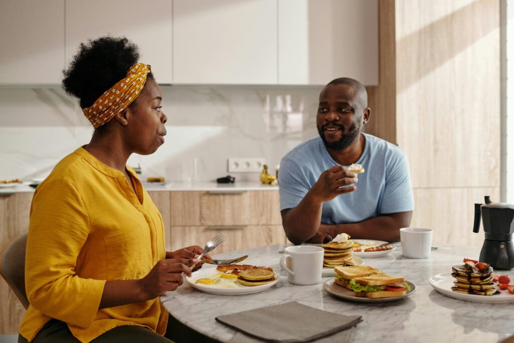Intimate moment during dinner showing renewed emotional connection.