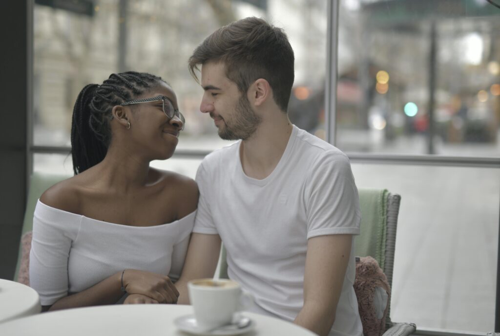 Married couple enjoying quality time together during a date night at a café