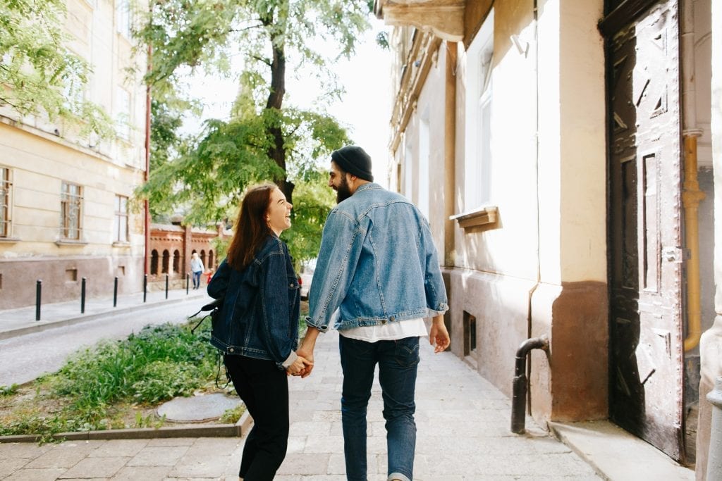 Small gesture of holding hands symbolizing emotional connection in marriage
