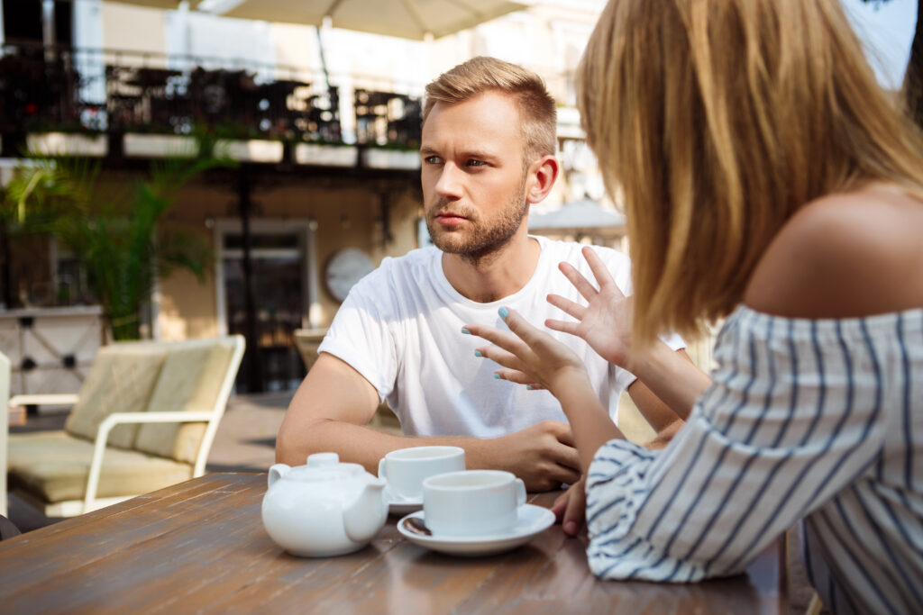 Partners engaging in heartfelt conversation to reconnect emotionally.