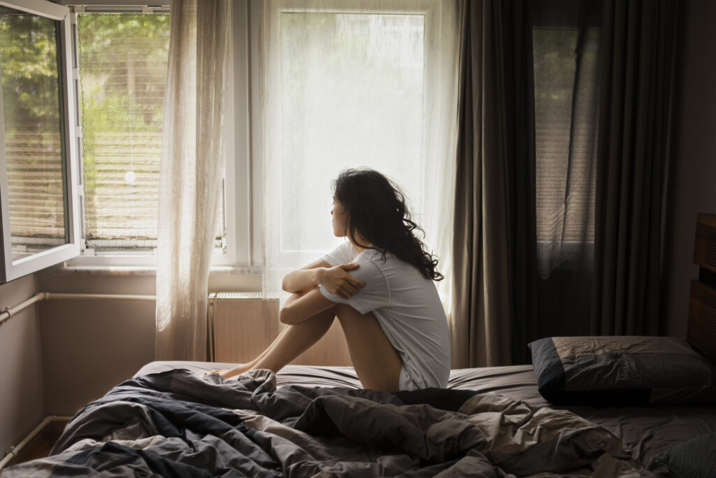 A woman seeking emotional refuge and peace in a difficult marriage