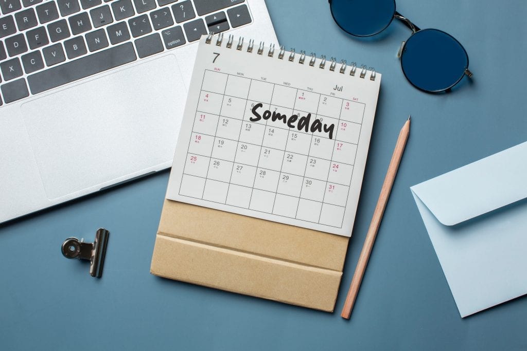 Empty calendar page with "someday" penciled in-symbolizing indefinite delay in marriage