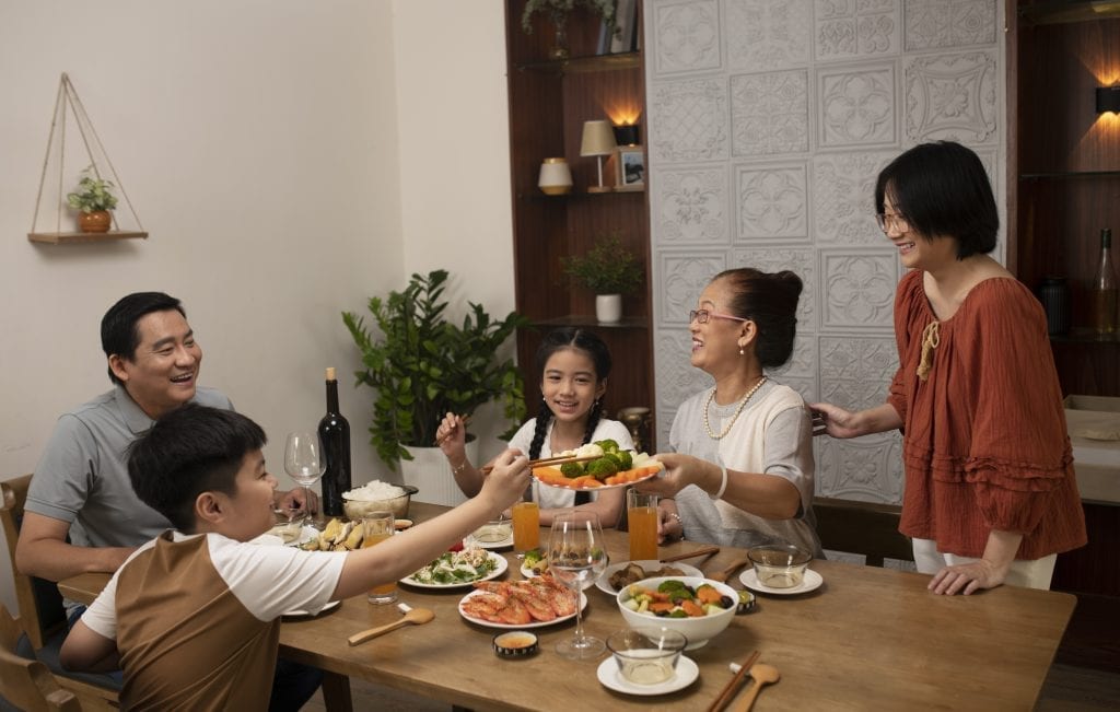 Family dinner creating connection through high-impact moments.