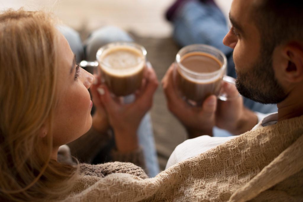 Married couple enjoying morning coffee together, appreciating everyday intimacy