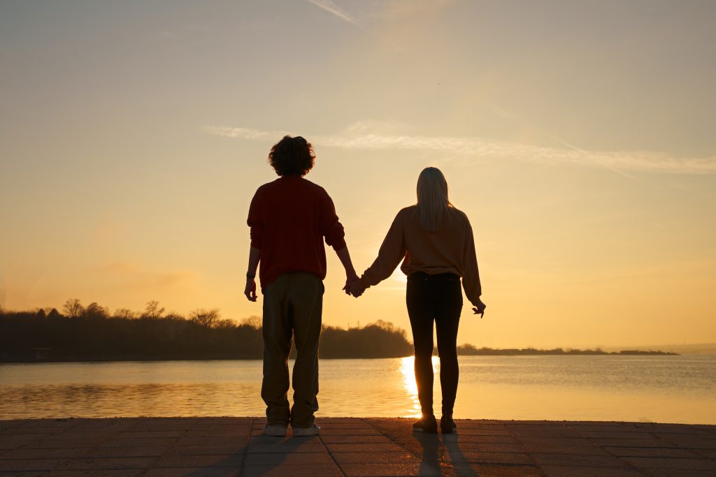 Married couple walking into the future together, symbolizing a marriage strengthened by growth.