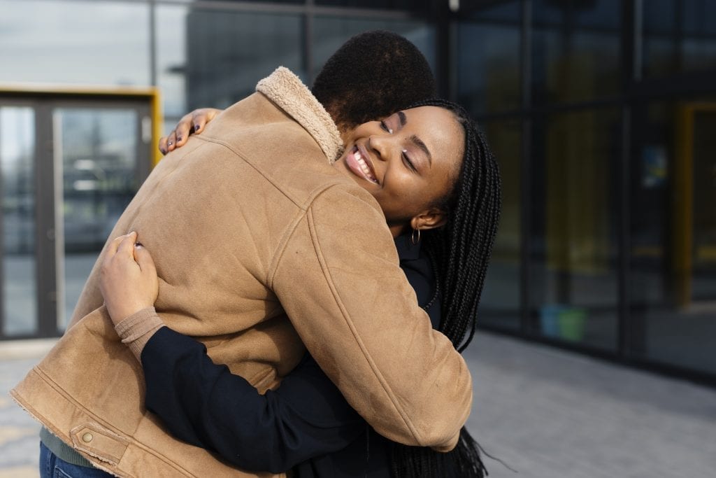 Married couple embracing lovingly, representing prevention habits that strengthen marriage.