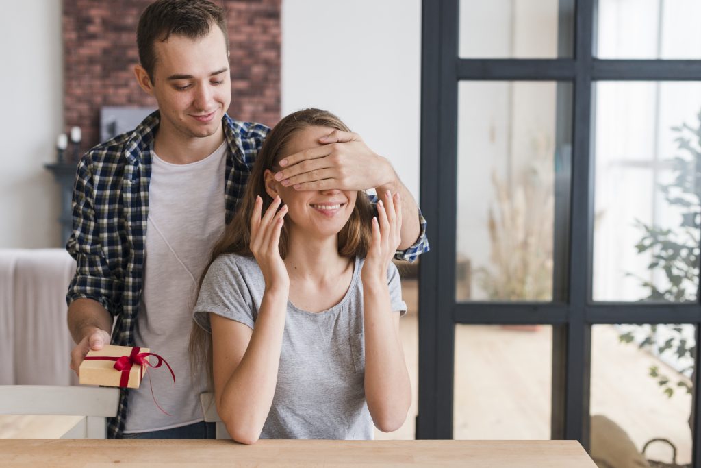 A loving gesture between spouses showing leadership through love.