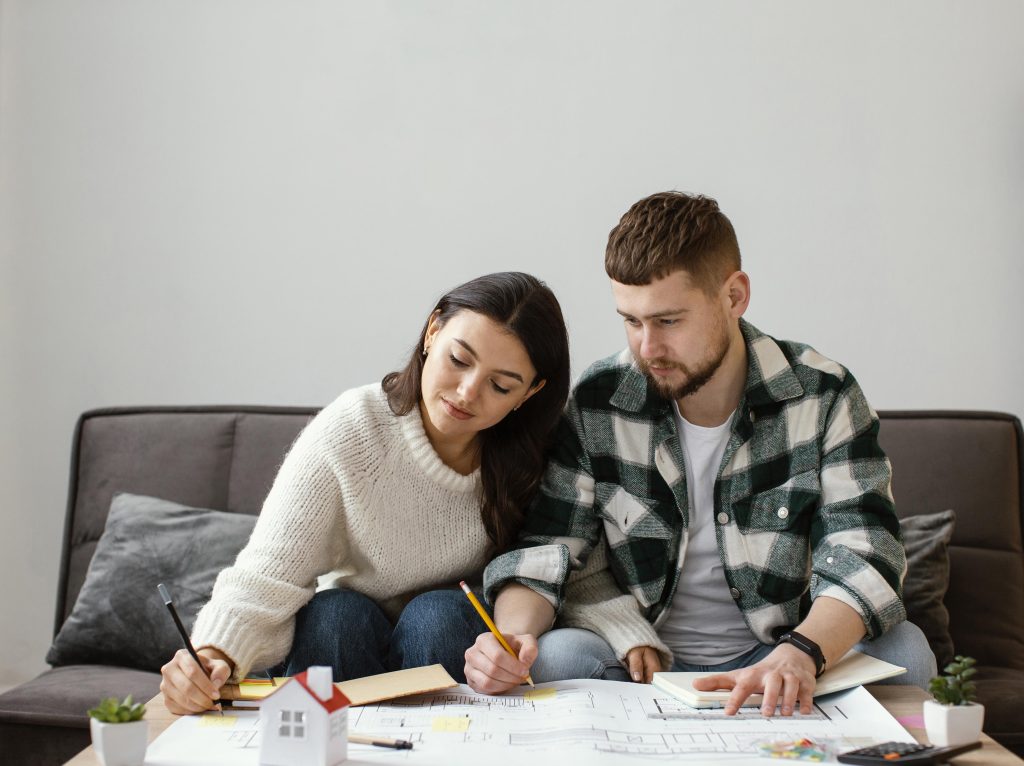 Married couple planning together during peaceful season, preparing for the future