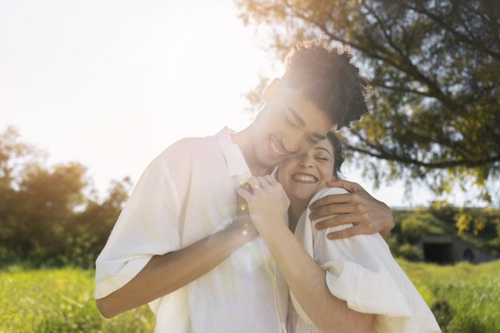 Husband and wife sharing a quiet embrace, reaffirming their commitment to respect and emotional safety.