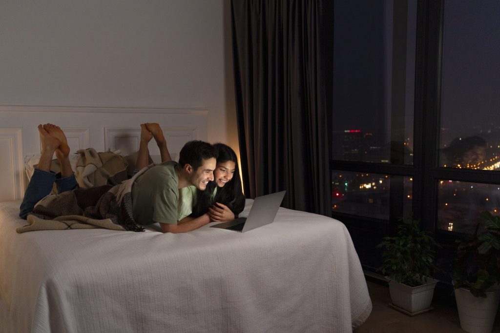 Married couple reading and relaxing together, reflecting consistent emotional presence