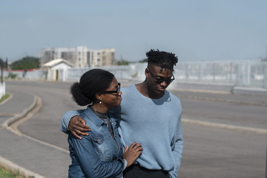 Couple sharing a quiet walk after tension, representing growth in progress