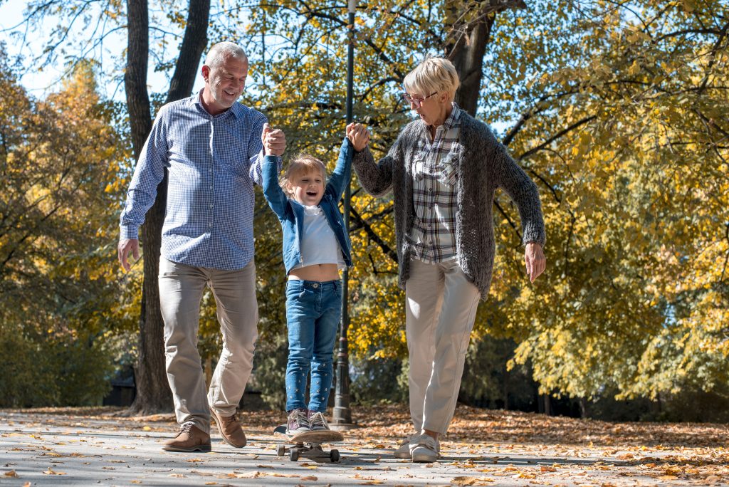 Grandparents modeling lifelong love, building family legacy through steady affection