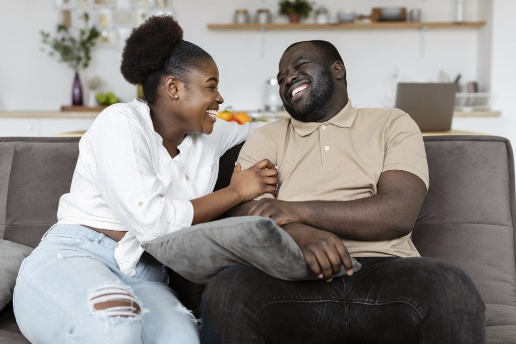 Happy couple enjoying closeness thanks to adopting preventative marriage habits.
