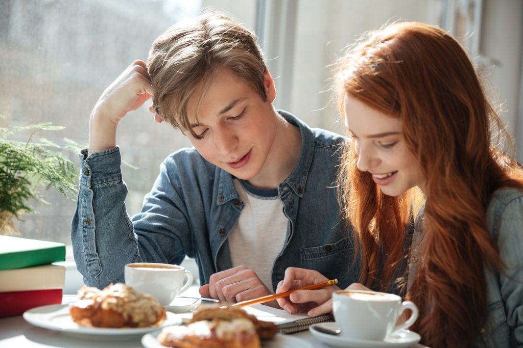 Married couple engaging in intentional relationship feedback to grow together.