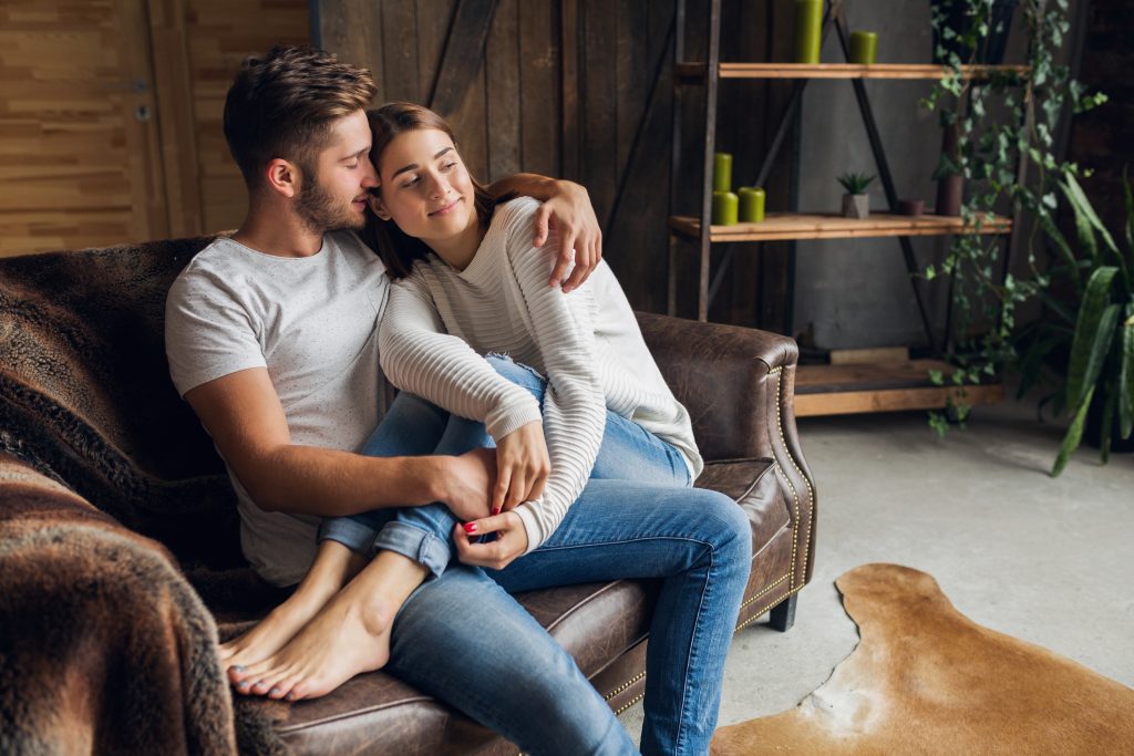 Married couple sharing quiet moment, reflecting emotional endurance