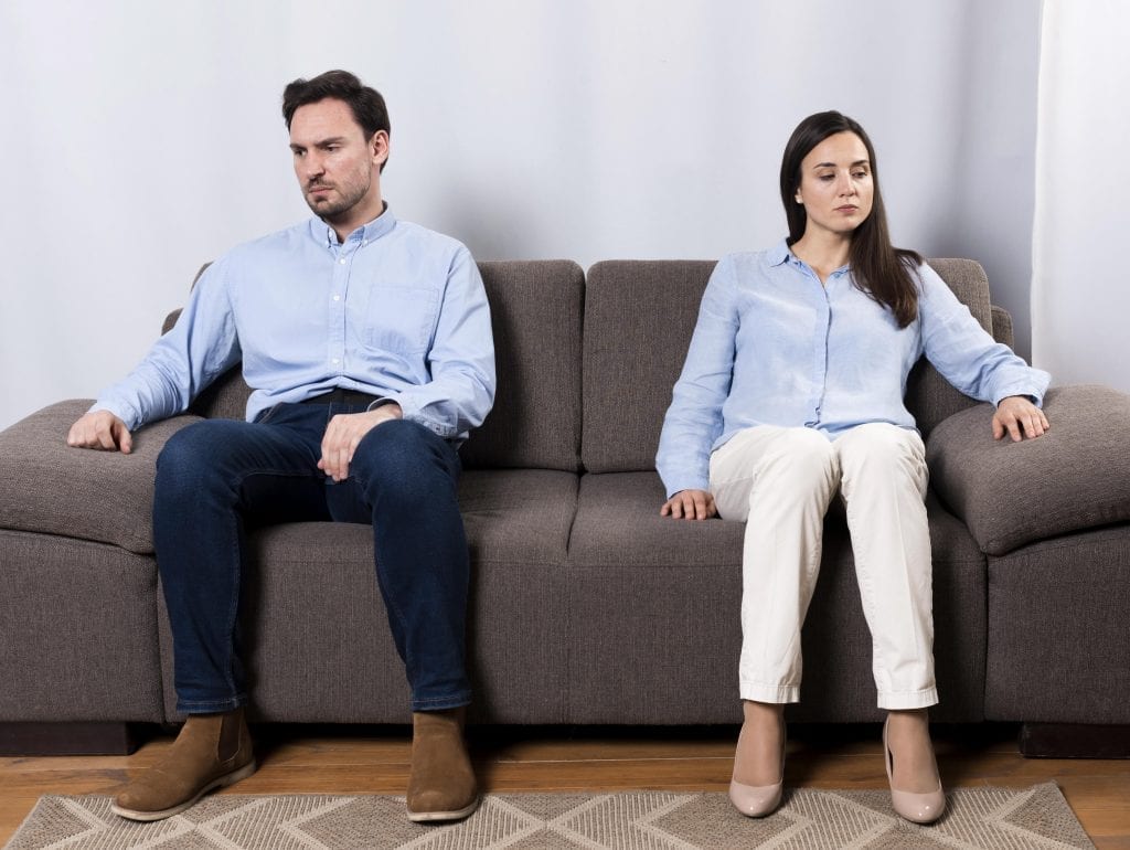 Couple sitting quietly together symbolizing emotional presence and maturity.