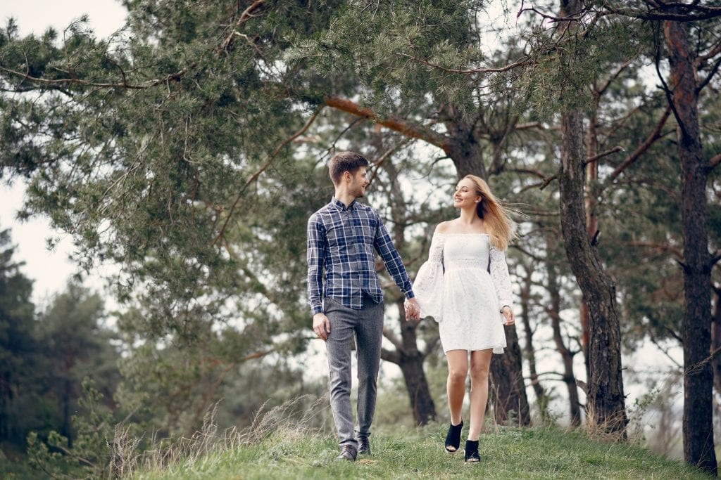 Couple walking together outdoors, symbolizing positive changes in marriage.