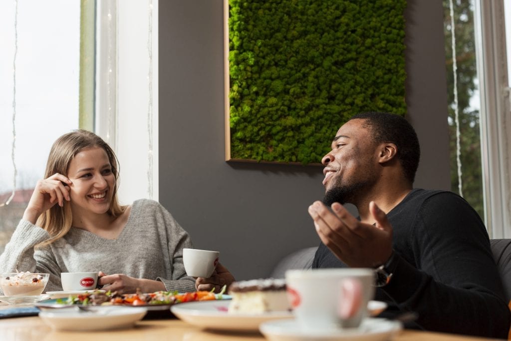 Intimate dinner conversation reflecting trust and respect in marriage.