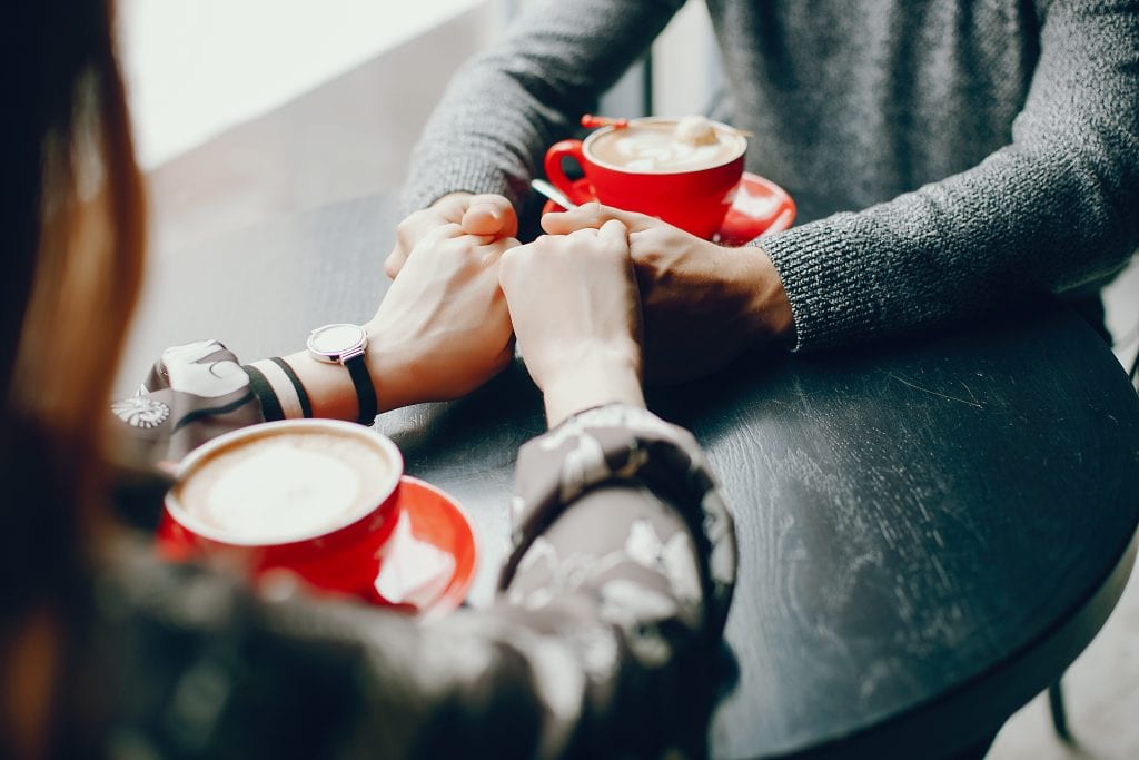 Discomfort strengthens your marriage-hands held while discussing a hard topic.