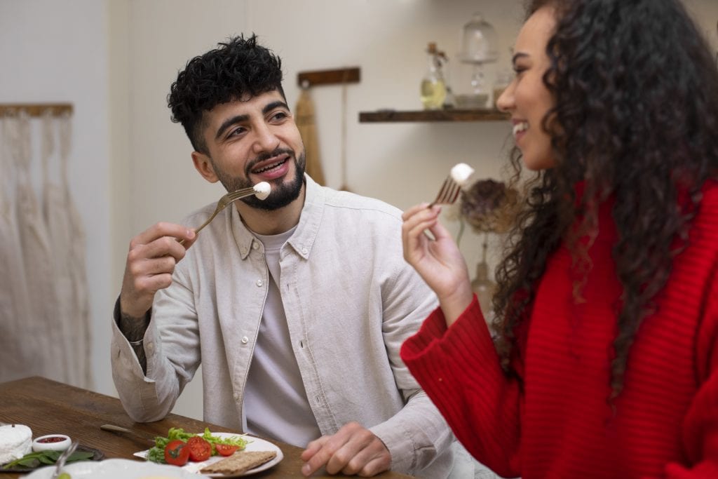 Married couple enjoying a meal, symbolizing nourishing communication in marriage.