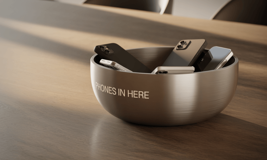 kitchen table bowl labeled phones in here to encourage device-free rituals