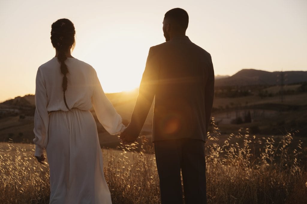 Couple enjoying the peace of consistent connection after learning how to make habits stick.