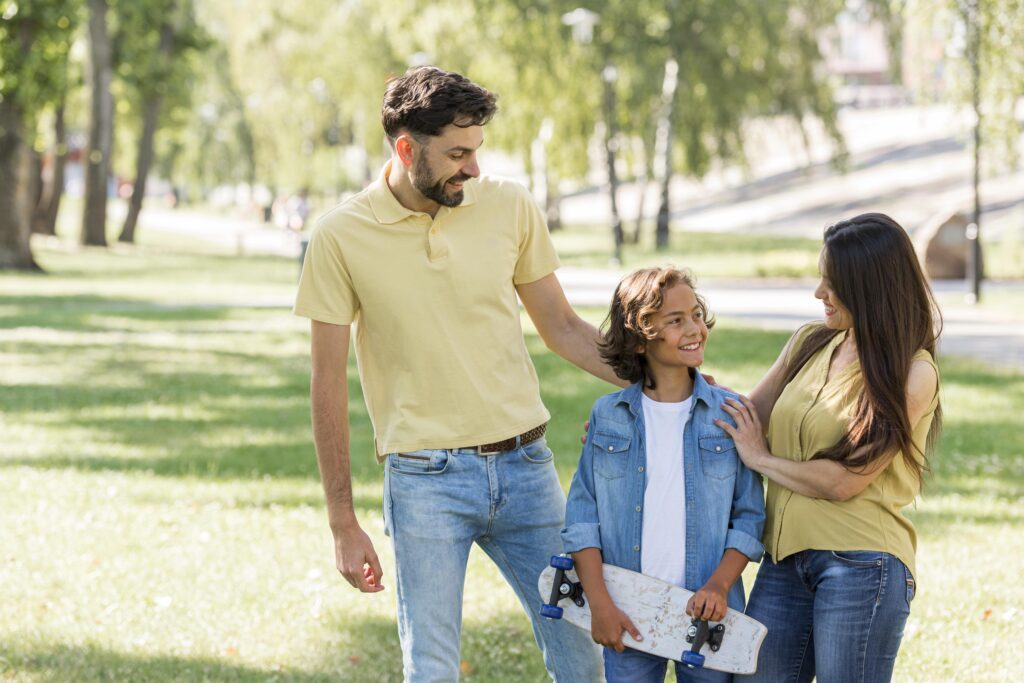 family walking peacefully in park after resolving a boundary conversation