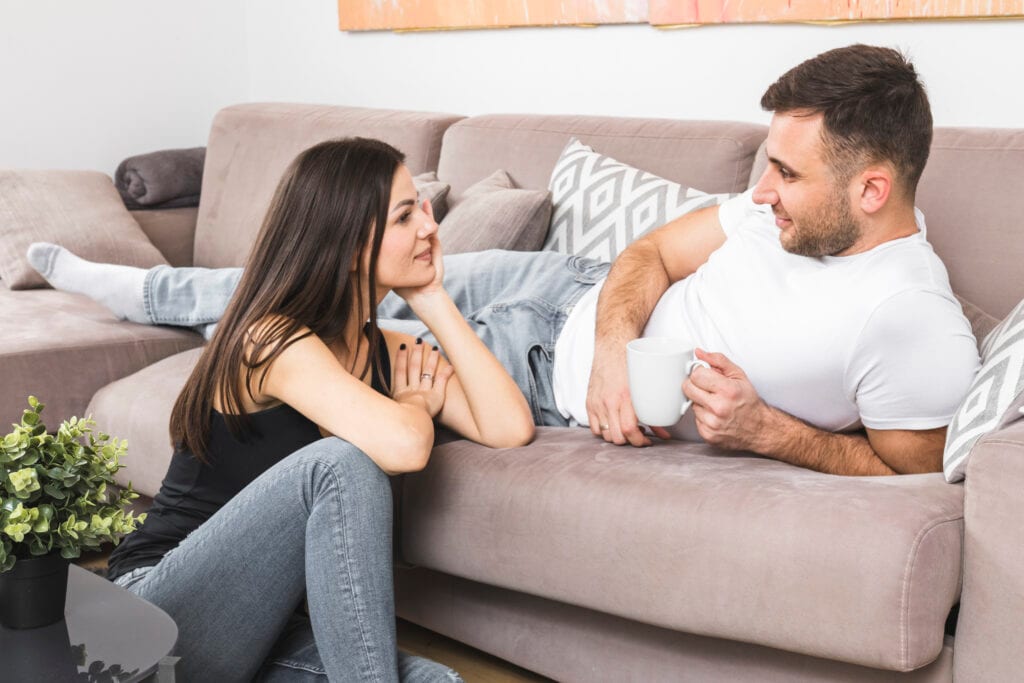 Spouses enjoying a calm, heartfelt moment during their 10-minute connection ritual.