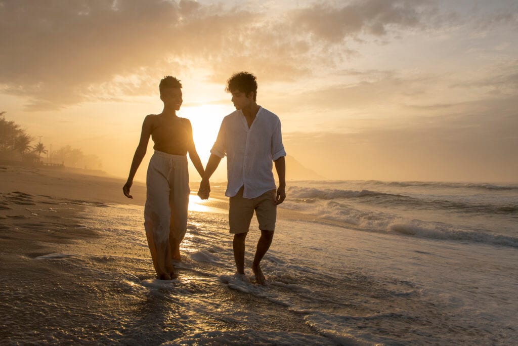 Married couple walking at sunset, symbolizing lasting balance and calm after the reset.